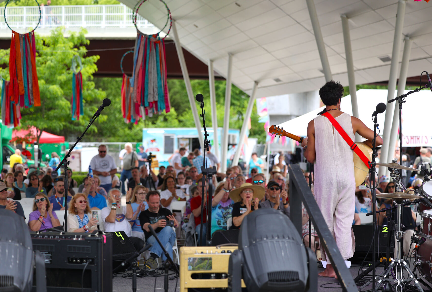 Crowd watches singer at Abbey Road on the River.JPG
